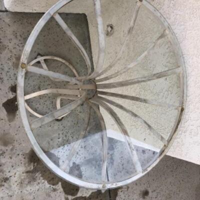 Lot 6. Iron tall outdoor glass-top iron table (36â€ x 30â€)--$35 