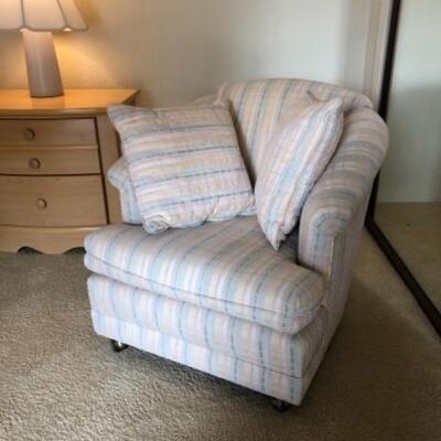 Lot 11. Upholstered armchair with matching pillows (27â€H x 30â€W x 36â€D)--$45 