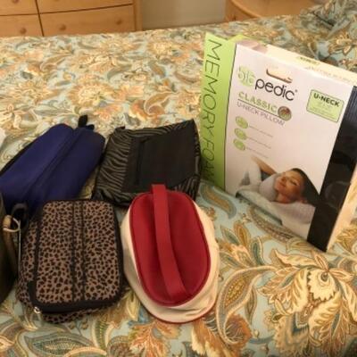 Lot 19. Travel Accessories: Two carry-ons, luggage scale, 5 cosmetic bags, 2 laundry bags, 2 luggage racks, memory foam travel pillow--$30