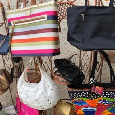 Lot 20. 26 assorted hand bags (cross-body, clutches, totes, etc. (some designer)--$95