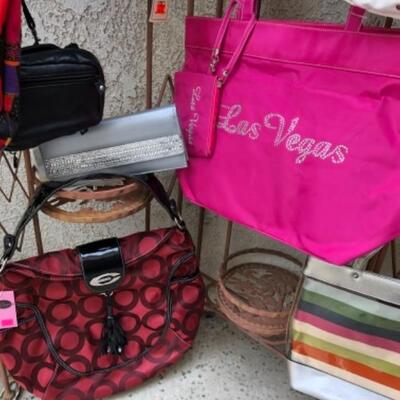 Lot 20. 26 assorted hand bags (cross-body, clutches, totes, etc. (some designer)--$95