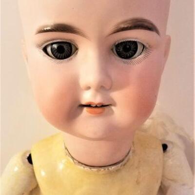 Lot #107  Antique German Bisque FloraDora Doll with Composition body - all original