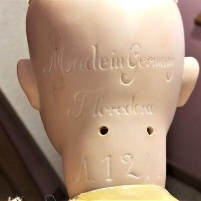Lot #107  Antique German Bisque FloraDora Doll with Composition body - all original