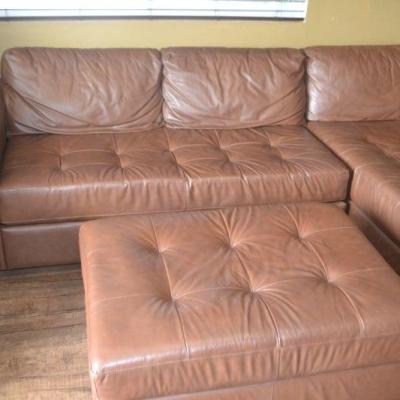 LOT 8 LEATHER SECTIONAL AND OTTOMAN 