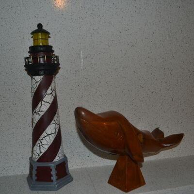 LOT 54 CARVED WHALE AND DECORATIVE LIGHT HOUSE