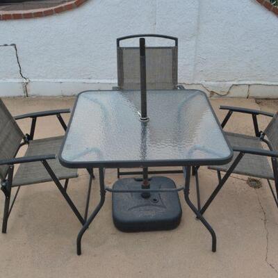 LOT 116 PATIO TABLE WITH 3 FOLDING CHAIRS