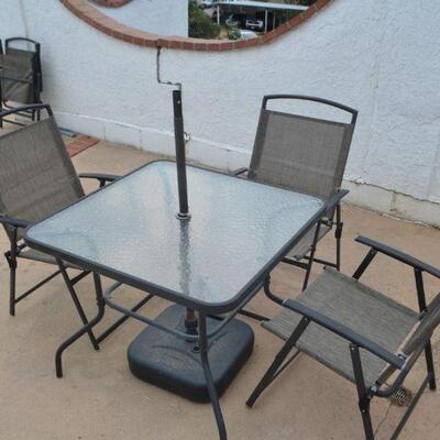 LOT 116 PATIO TABLE WITH 3 FOLDING CHAIRS