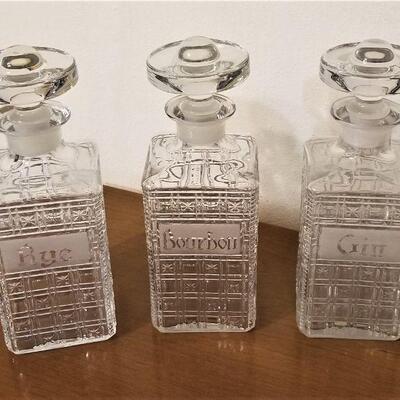 Lot #128  Three Decanters - Gin/Rye/Bourbon