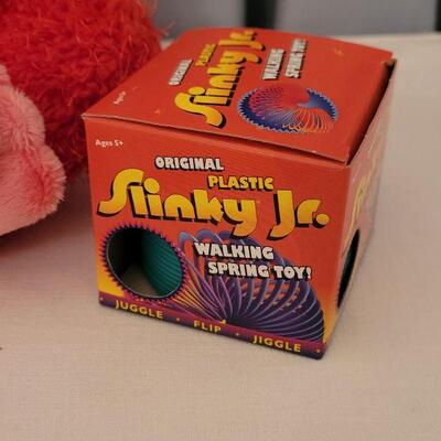 Lot 13: NEW Animated Monkey, Valentine's Tic Tac Toe & a Slinky