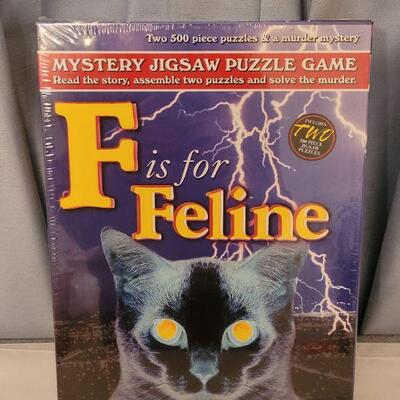 Lot 35: NEW Puzzle and (2) Books