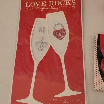 Lot 52: NEW Valentine's Day Shoe Clips, Bling for Glasses, Lip Gloss, Pillowcase and Talking Bear