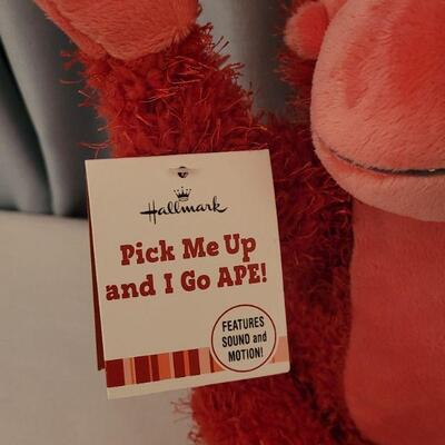 Lot 62. New Animated Valentine's Ape, Recordable Heart Keychain, Socks, Make Up Brushes and Pouch, Heart BeaN bags, Sunglasses &...