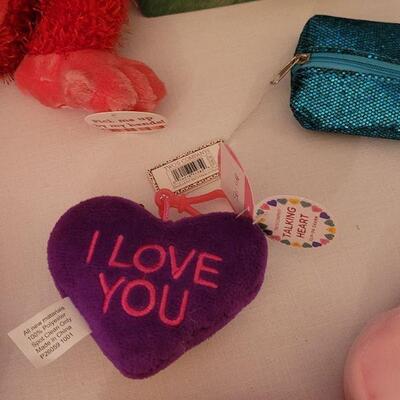 Lot 62. New Animated Valentine's Ape, Recordable Heart Keychain, Socks, Make Up Brushes and Pouch, Heart BeaN bags, Sunglasses &...
