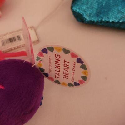 Lot 62. New Animated Valentine's Ape, Recordable Heart Keychain, Socks, Make Up Brushes and Pouch, Heart BeaN bags, Sunglasses &...