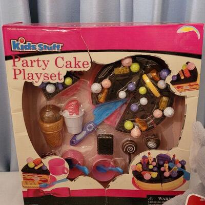 Lot 72:  New 18" Doll Clothes, Plushie and Party Cake Playset
