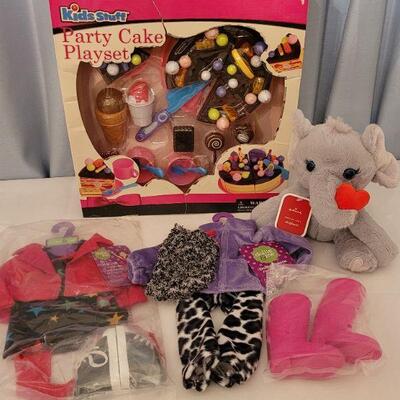 Lot 72:  New 18" Doll Clothes, Plushie and Party Cake Playset