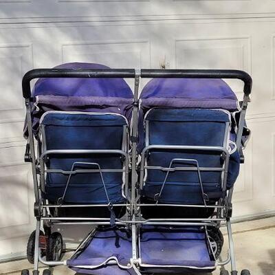 Lot 81: Large 2-Child RHINO Stroller WORKS GREAT