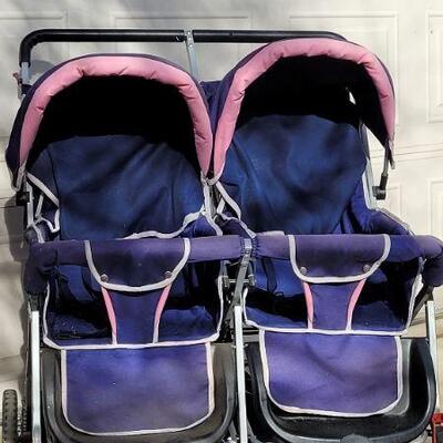 Lot 81: Large 2-Child RHINO Stroller WORKS GREAT