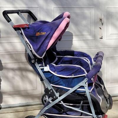 Lot 81: Large 2-Child RHINO Stroller WORKS GREAT