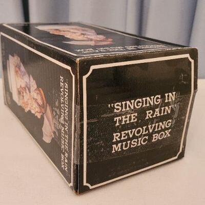 Lot 120: Vintage NEW "Singing in the Rain" Revolving Musical Box