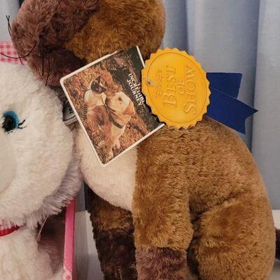 Lot 142: New Bell Interactive Story Buddy Dog with Book & CD and Disney's Tao Best in Show Cat