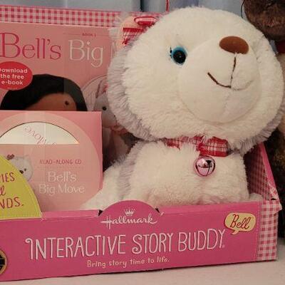 Lot 142: New Bell Interactive Story Buddy Dog with Book & CD and Disney's Tao Best in Show Cat