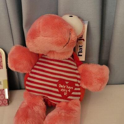 Lot 158: New Makeup Bag, Photo Clutch, Lip Gloss Ring, Turtle Plushie 