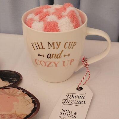 Lot 166: New Metal Hanging Flower & Coffee Cup with Fuzzy Socks 