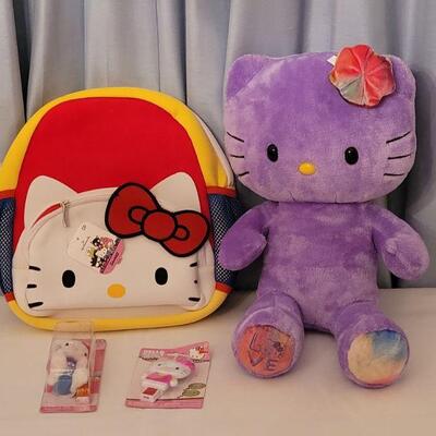 Lot 174: NEW Hello Kitty Plushie, Backpack, Pez and Lip Gloss