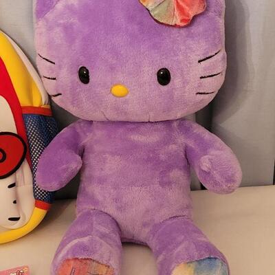 Lot 174: NEW Hello Kitty Plushie, Backpack, Pez and Lip Gloss