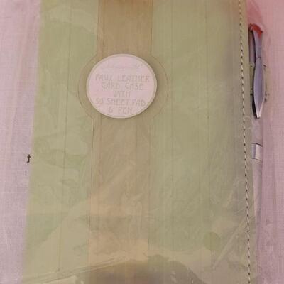 Lot 183: NEW Scarf, Notepads, Lip Gloss, Make Up Bag and Plushie