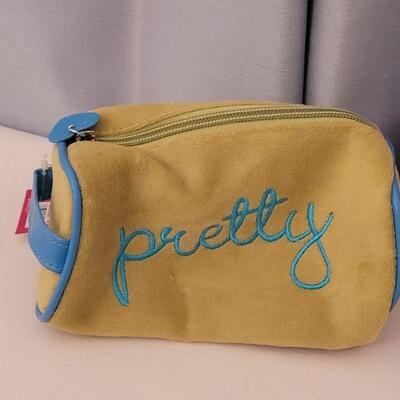 Lot 183: NEW Scarf, Notepads, Lip Gloss, Make Up Bag and Plushie