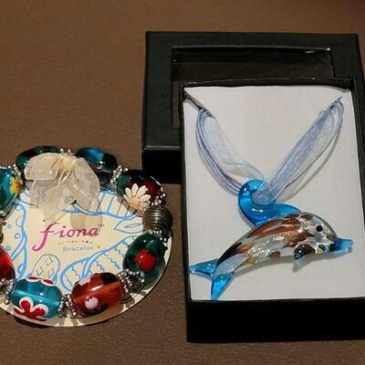 Lot 204: NEW Glass Dolphin Pendant Necklace and Glass Bead Bracelet 