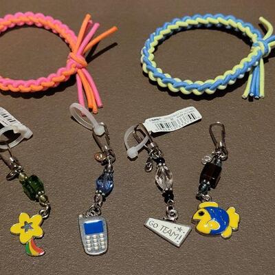 Lot 214: NEW Charm Pulls and Bracelets 