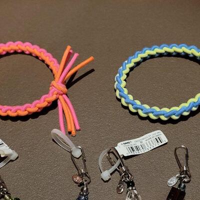 Lot 214: NEW Charm Pulls and Bracelets 