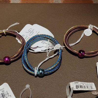 Lot 216: NEW Charm Pulls, Hair Ties & Bracelet
