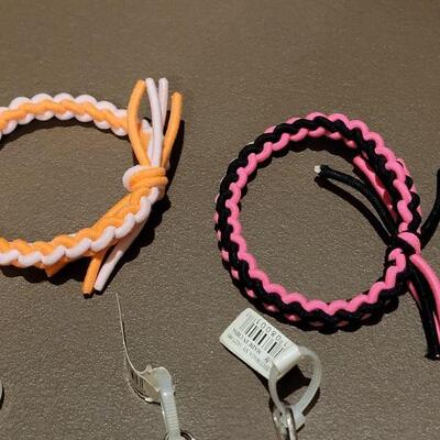 Lot 221: NEW Charm Pulls and Bracelets 