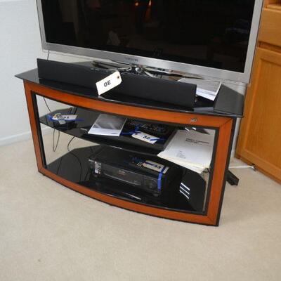 LOT 34 WOOD AND GLASS TV STAND