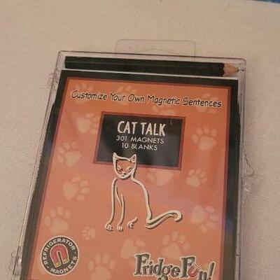 Lot 33: Assorted Cat Themed Books + Magnets