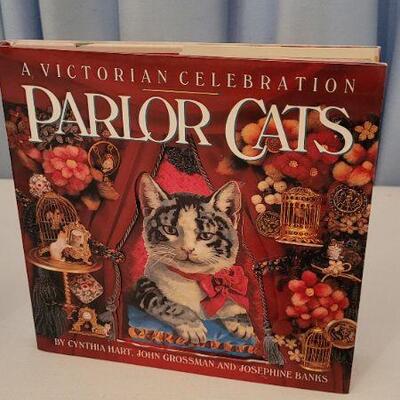 Lot 33: Assorted Cat Themed Books + Magnets