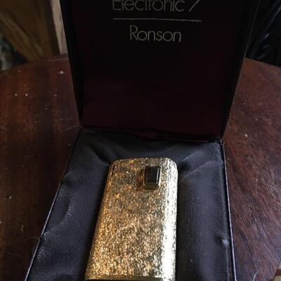 Ronson Electronic 7 Vintage Gold Lighter with Lucky Strike Advertising. LOT A35