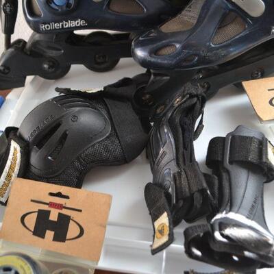 LOT 218 ROLLER BLADES AND GEAR