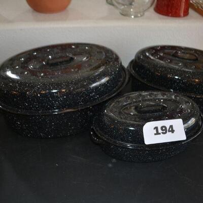 LOT 194    THREE METAL ROASTER PANS WITH LIDS