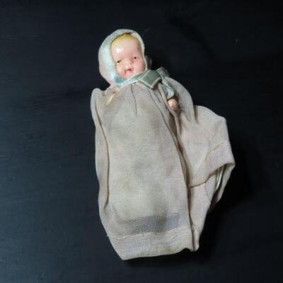 Antique mini doll