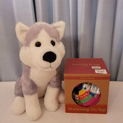 Lot 140: New FAO Spinning Top and Dog Plushie