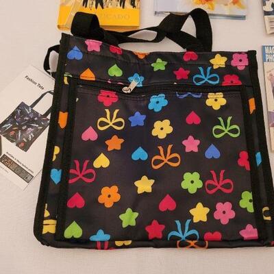 Lot 141: New Tote, Magnets, Books and Laptop Skin 