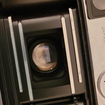 Lot 153: Vintage Yashica 35mm Camera with Box and Case