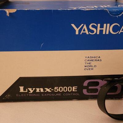 Lot 153: Vintage Yashica 35mm Camera with Box and Case