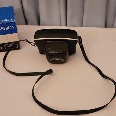 Lot 153: Vintage Yashica 35mm Camera with Box and Case