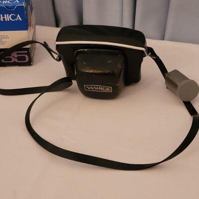 Lot 153: Vintage Yashica 35mm Camera with Box and Case